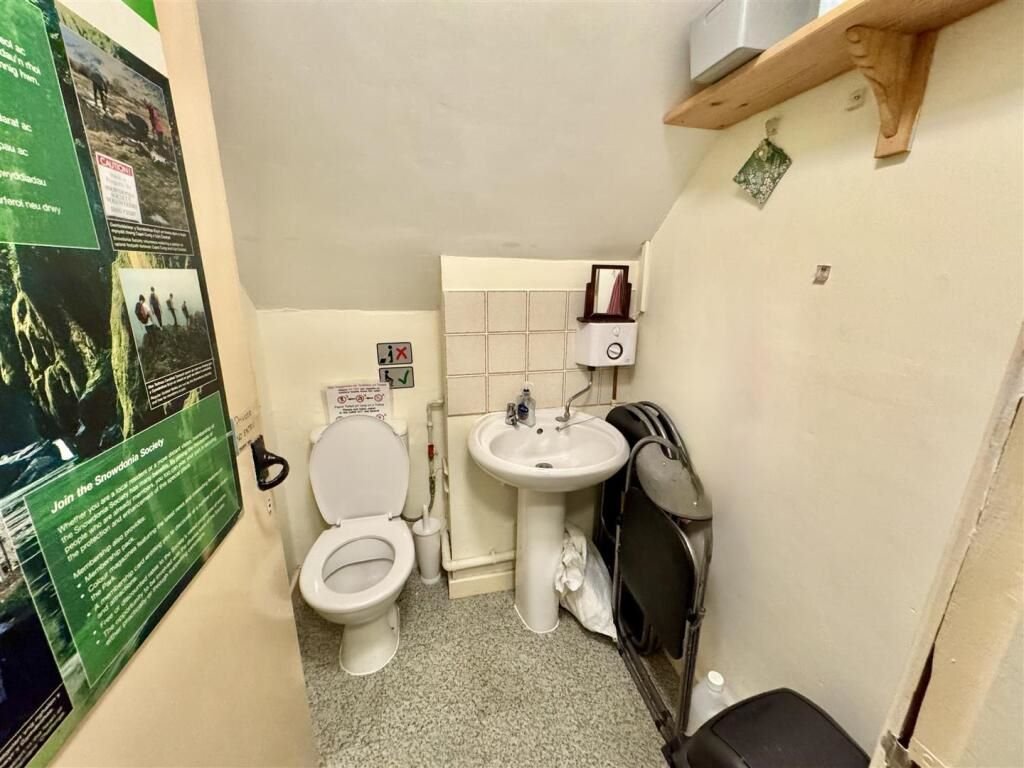 A famous ugly house steeped in Welsh folklore has gone on sale for £199,000 - but locals are furious and have launched a petition to pause the auction.