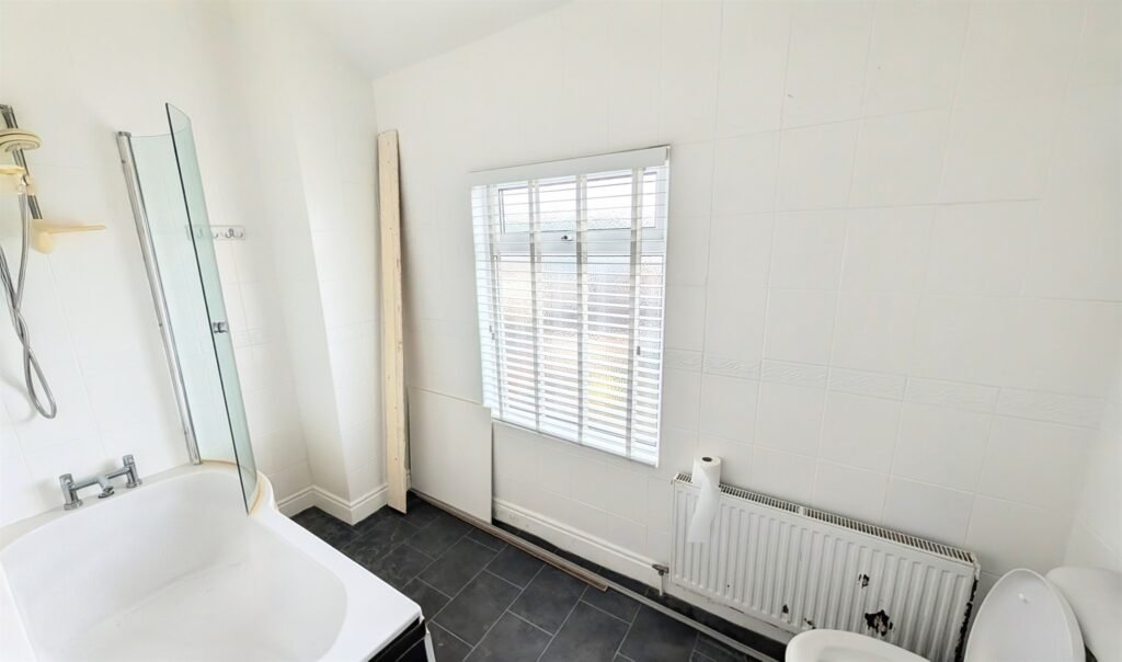 An unassuming four-bed home has hit the market for just £200,000 - but buyers might not expect its rather unusual past as a cannabis factory.