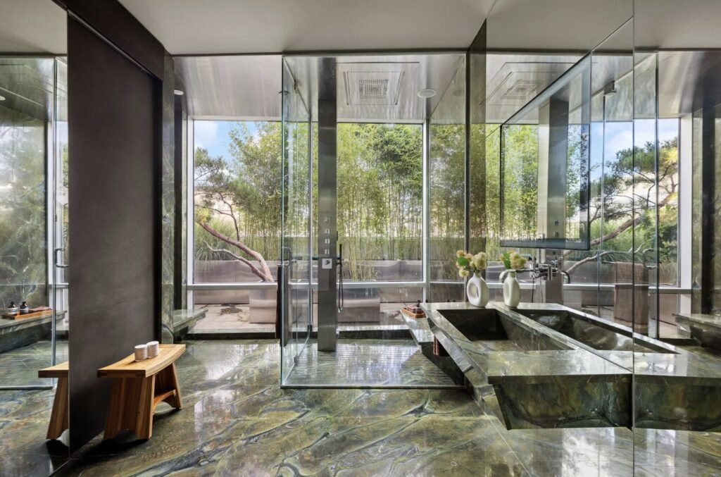 Arsenal legend Thierry Henry has relisted his SoHo penthouse for $25million after slashing the price - and it comes with a huge rooftop with views of the Brooklyn Bridge.