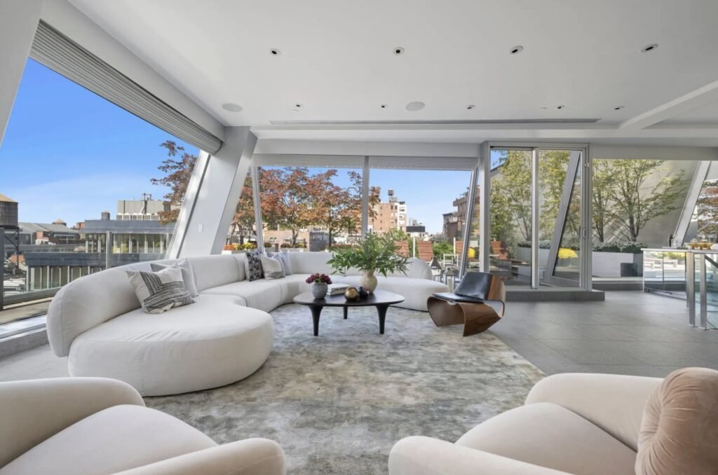 Arsenal legend Thierry Henry has relisted his SoHo penthouse for $25million after slashing the price - and it comes with a huge rooftop with views of the Brooklyn Bridge.