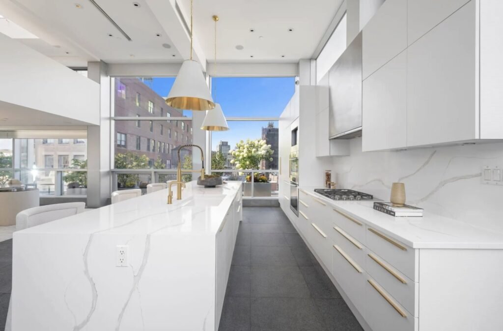 Arsenal legend Thierry Henry has relisted his SoHo penthouse for $25million after slashing the price - and it comes with a huge rooftop with views of the Brooklyn Bridge.