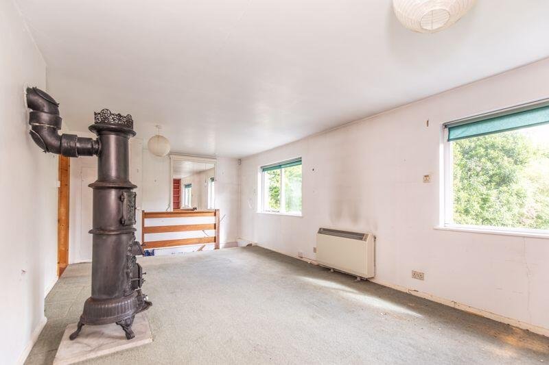 The wonderfully eccentric home where Raymond Briggs created The Snowman has gone on sale for £775,000 - complete with a bedroom hidden behind a bookcase door.