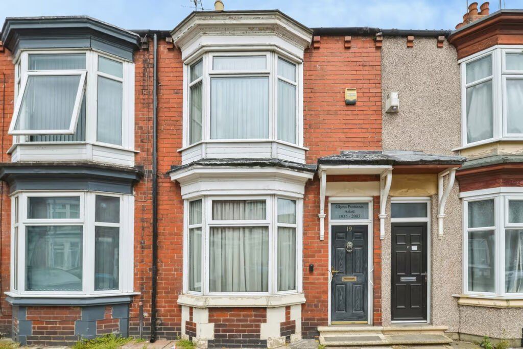 A three-bed home has gone on sale for £110,000 with an "un-loo-sual" twist - a toilet hidden in the kitchen, just feet from the cooker, fridge and sink.