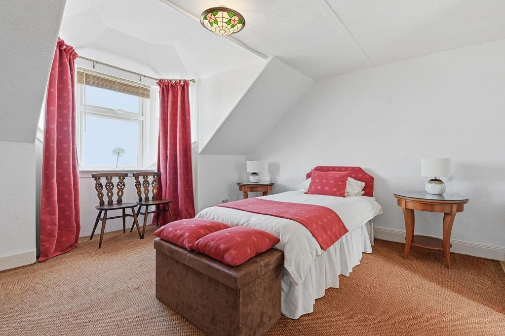 An ordinary-looking house on sale for £600,000 hides a huge ballroom with a dance floor, stage and starry ceiling - plus a stone wishing well in the dining room.