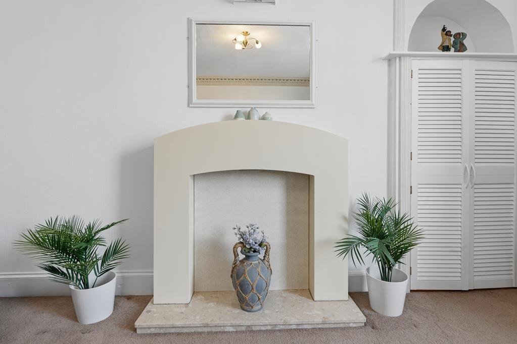 An ordinary-looking house on sale for £600,000 hides a huge ballroom with a dance floor, stage and starry ceiling - plus a stone wishing well in the dining room.