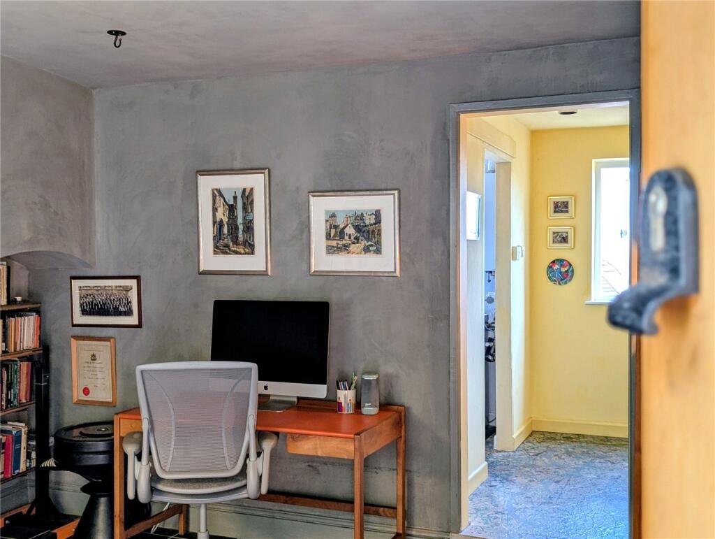 A quaint £220,000 cottage has gone on the market - but its bathroom arrangement, with the loo and bath behind see-through glass, may leave buyers feeling flushed.