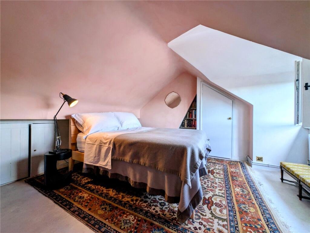 A quaint £220,000 cottage has gone on the market - but its bathroom arrangement, with the loo and bath behind see-through glass, may leave buyers feeling flushed.