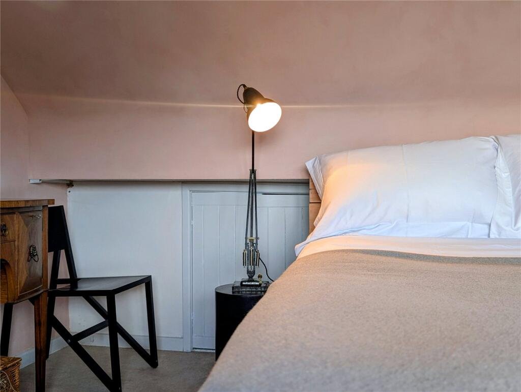 A quaint £220,000 cottage has gone on the market - but its bathroom arrangement, with the loo and bath behind see-through glass, may leave buyers feeling flushed.
