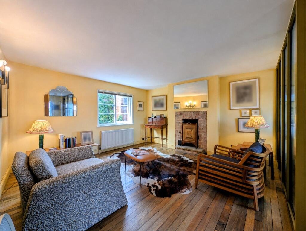 A quaint £220,000 cottage has gone on the market - but its bathroom arrangement, with the loo and bath behind see-through glass, may leave buyers feeling flushed.