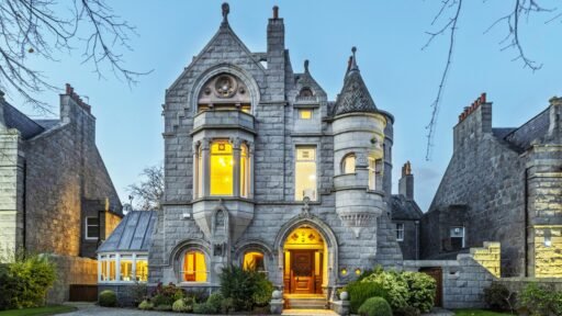A magnificent eight-bedroom castle boasting a secret door, turret bedroom and 20 stunning stained-glass windows has gone on the market for £1.5million.