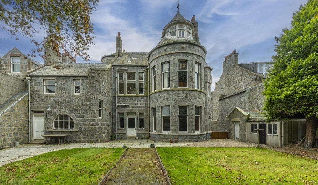 A magnificent eight-bedroom castle boasting a secret door, turret bedroom and 20 stunning stained-glass windows has gone on the market for £1.5million.