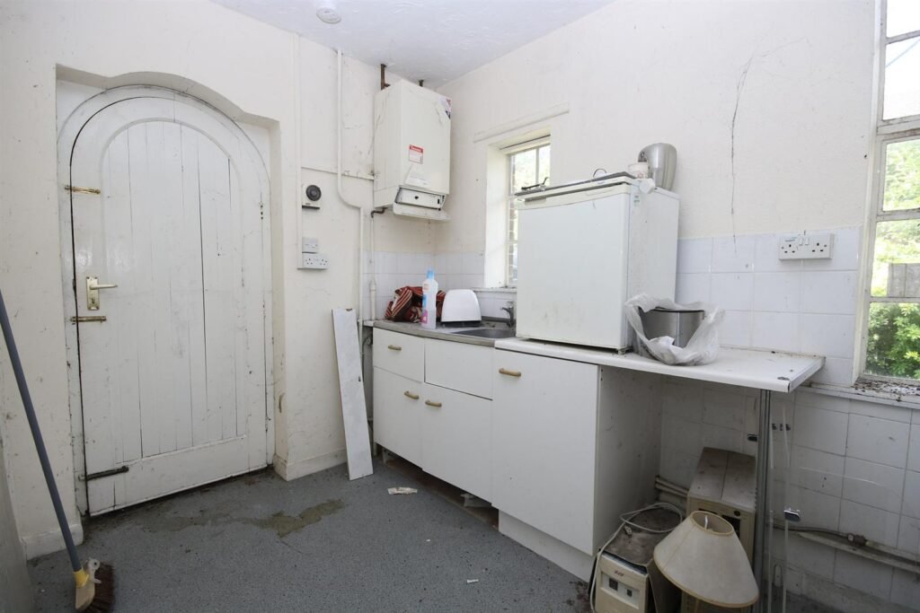 A three-bed detached home has hit the market for just £250,000 - but there's a catch, as the one-of-a-kind property sits inside the grounds of a crematorium.