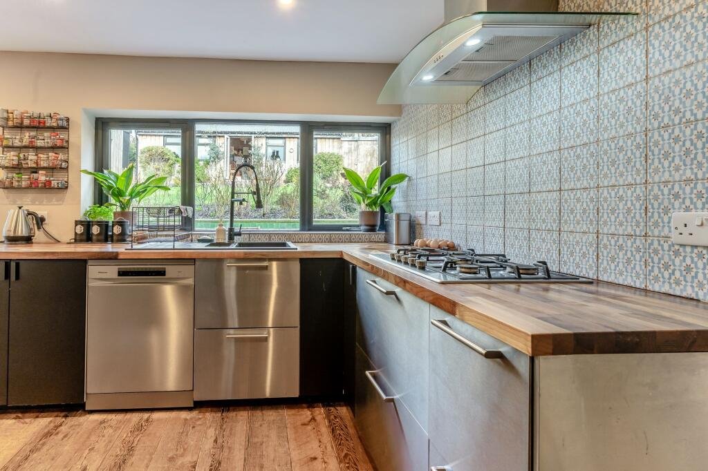 Charlotte Church's historic Welsh cottage has hit the market for £695,000 - complete with a secret music studio hidden away in its jungle-like exotic garden.