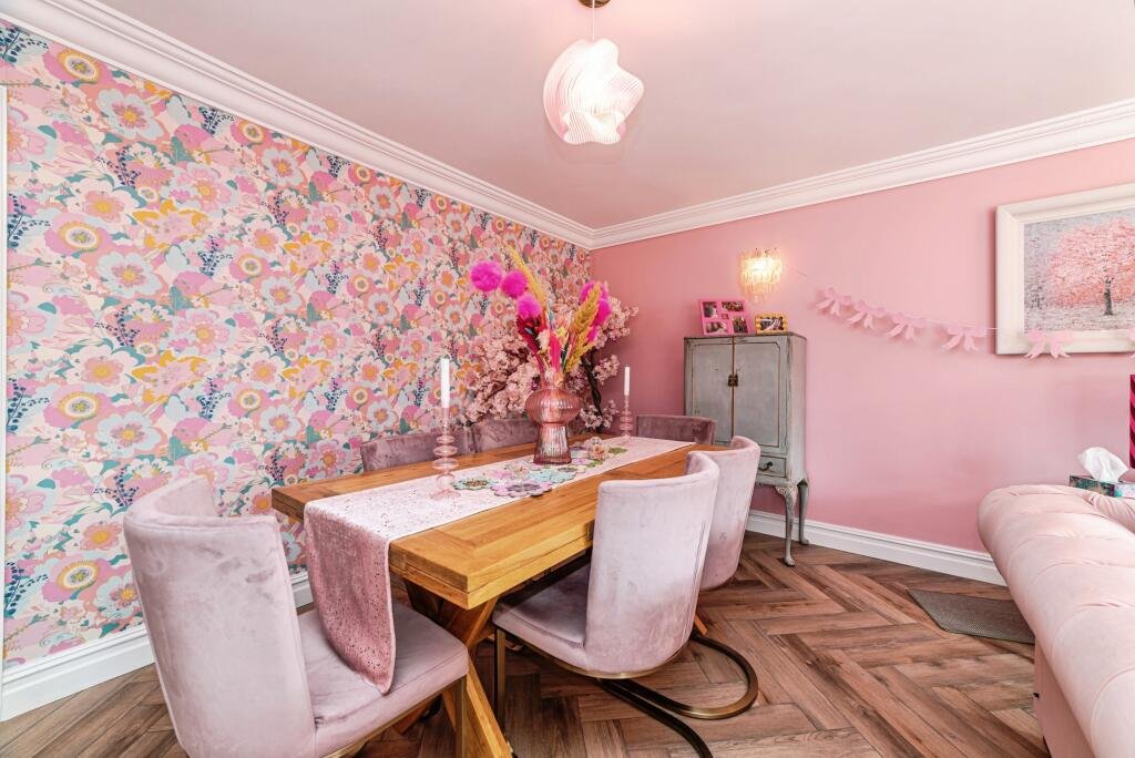 Britain's own Barbie Dream House is on sale for £725,000 - with a bubblegum kitchen, pink staircase, pink SMEG fridge and even a pink garage door.