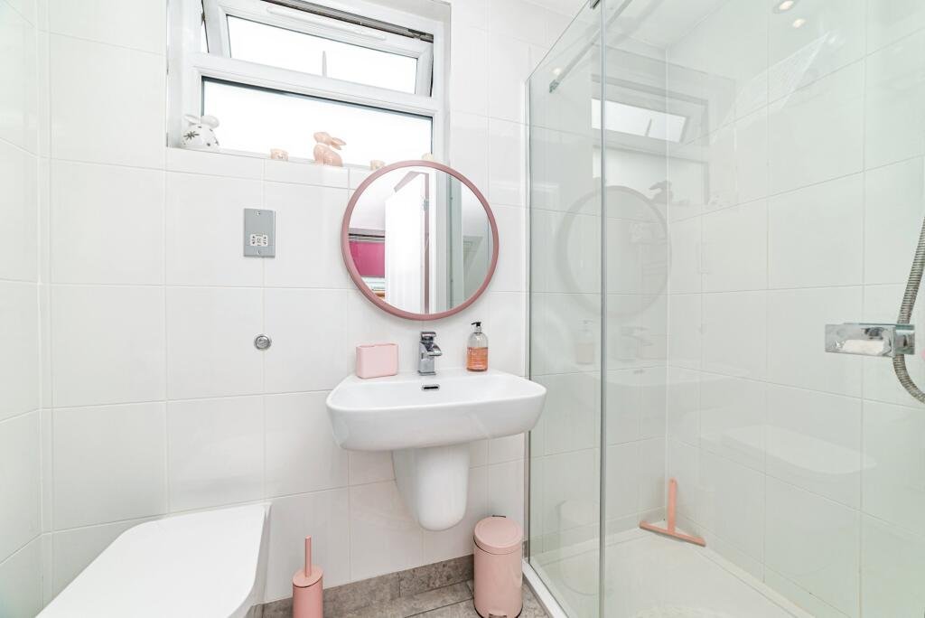 Britain's own Barbie Dream House is on sale for £725,000 - with a bubblegum kitchen, pink staircase, pink SMEG fridge and even a pink garage door.