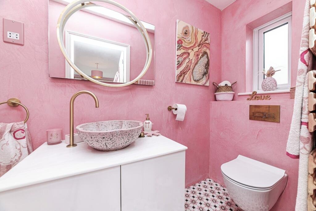 Sarah Wilkinson has poured £25,000 into turning her Berkshire home into a Barbie-inspired pink palace - from the garage door to her power drill - and it's now up for sale.