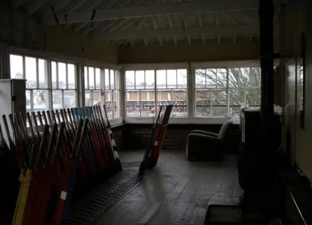 Britain's strangest holiday home - a Grade II-listed signal box on a working railway platform in Torquay, Devon - is on sale for just £29,000 at auction.