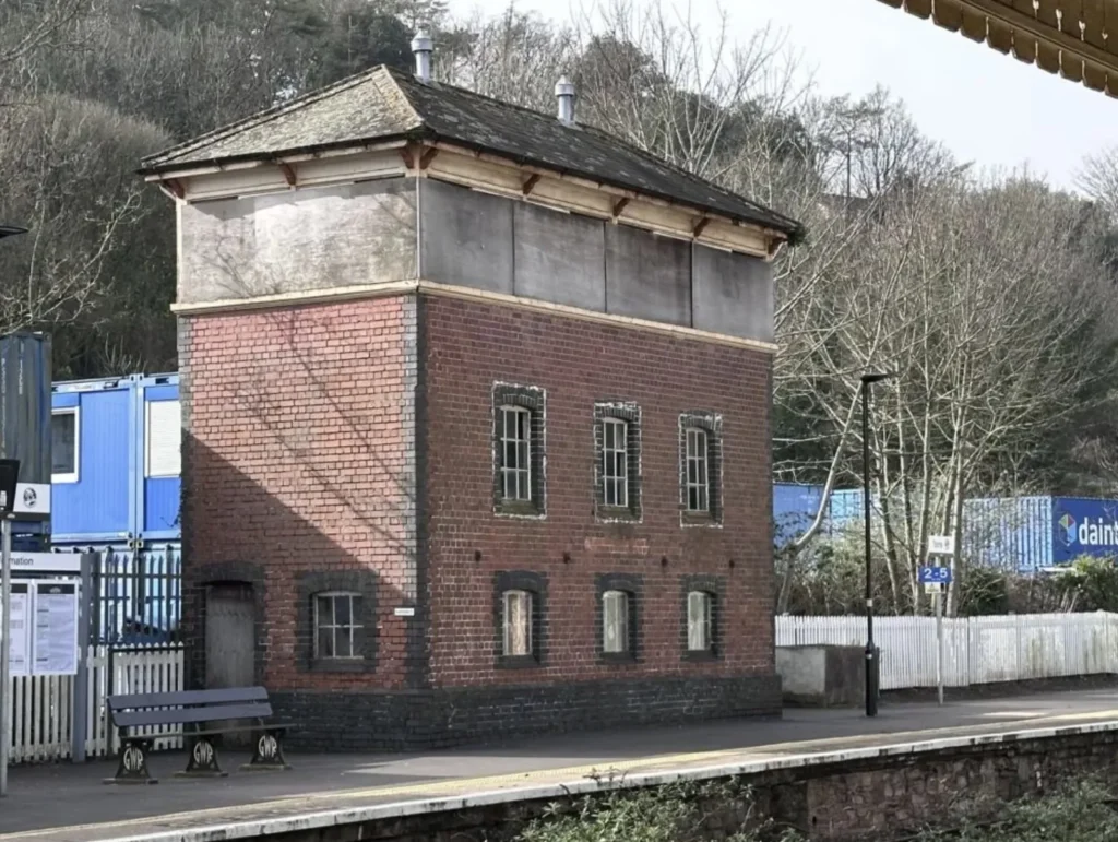 Britain's strangest holiday home - a Grade II-listed signal box on a working railway platform in Torquay, Devon - is on sale for just £29,000 at auction.