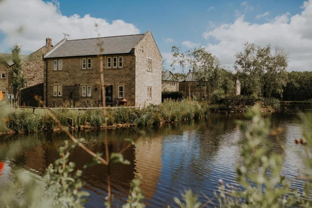 Entire 17-cottage Derbyshire village from Graham Norton's axed ITV show on sale for £7.5m. Historic estate with lake, chapel and events venue available.