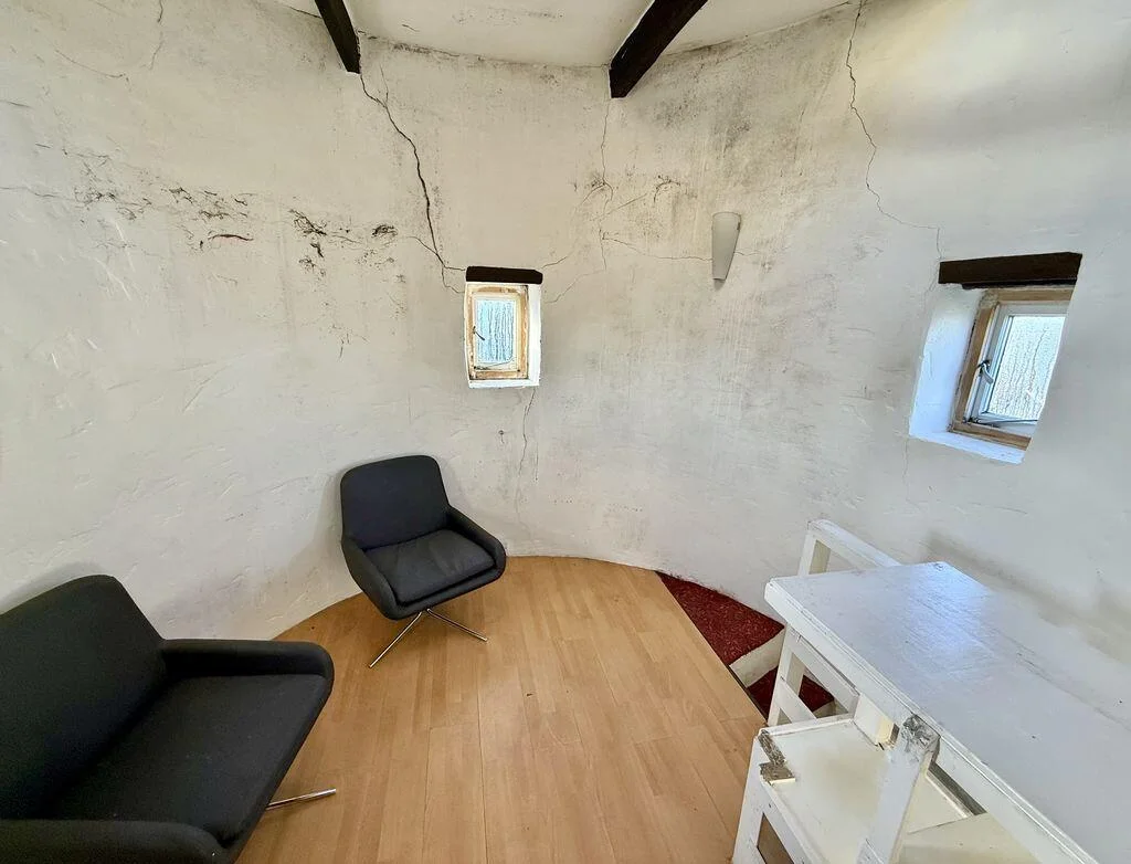 Grade II-listed folly tower in Sussex believed to have helped village bluff Napoleon's army sells for £200,000. Historic one-bed home with unique circular design.