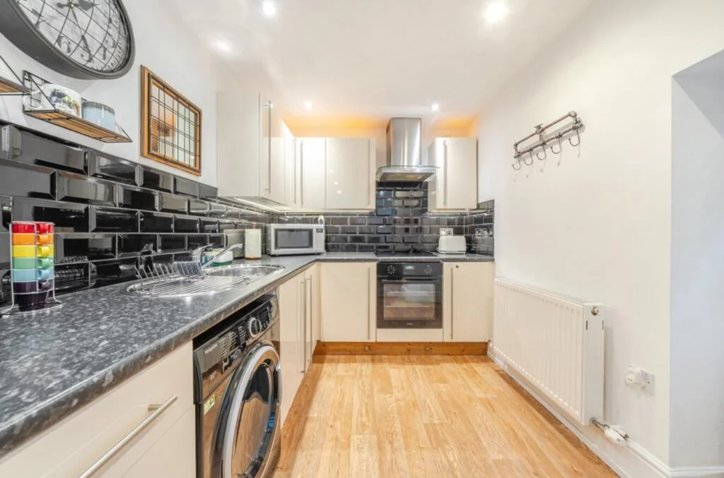 Quaint cottage with hidden 164ft underground tunnel linked to Baptist minister Dr John Fawcett on sale for £250,000 in West Yorkshire.