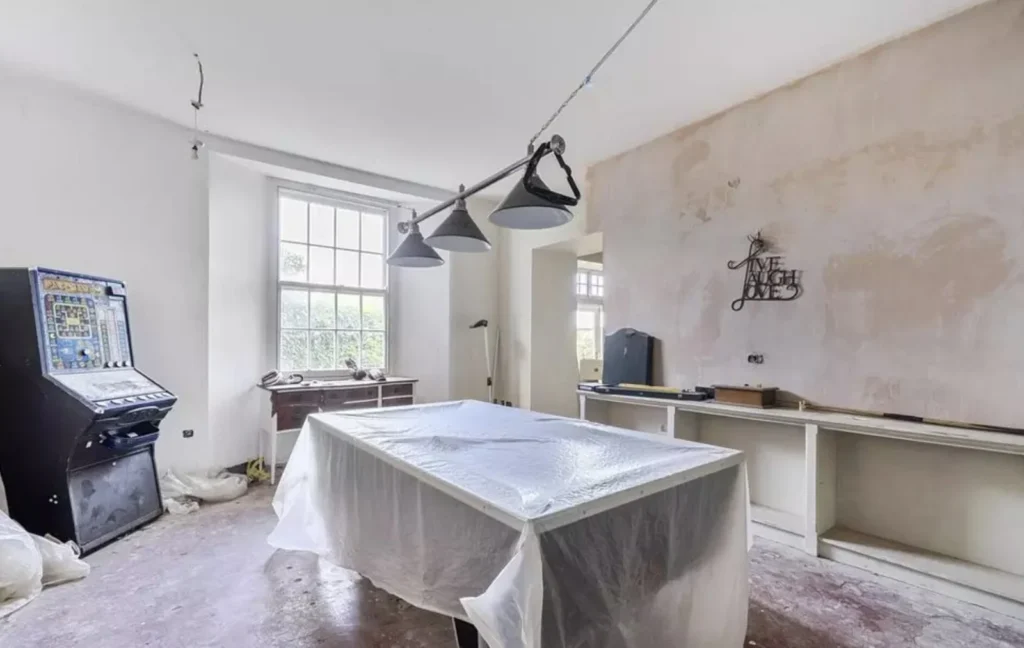 A sprawling 19-bed seaside manor with spectacular coastal views has hit the market for just £250,000 - but its new owner will have to tread unsafe areas if they want to.